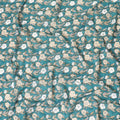 Sea green cotton lawn fabric with beige, black and off white print in floral design-D8439