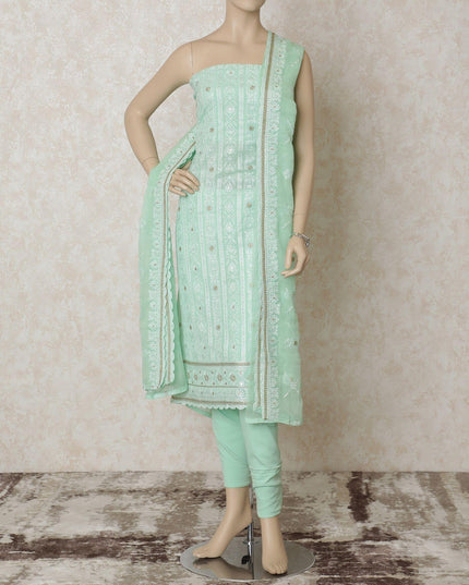 Turquoise green synthetic georgette kameez with same tone, gold embroidery having sequins in floral design. Turquoise green plain salwar with same tone chiffon dupatta having gold embroidery-D12633