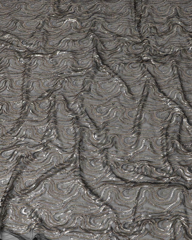 Black nylon tulle fabric with gold & silver sequins in fancy design