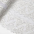 Pearl white nylon tulle fabric with embroidery and clip cord in floral design