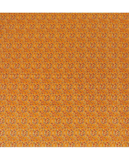 Mustard orange cotton viscose fabric with black, orange and gold print in batik design-D14195