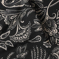 Black viscose crepe printed fabric with white prints in floral design-D11170
