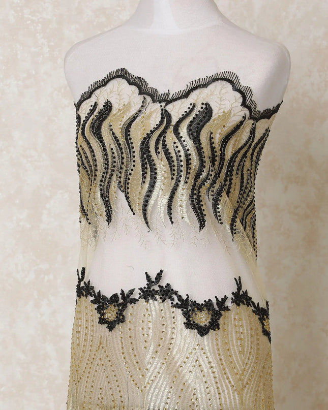 Gold nylon tulle fabric with same tone, black embroidery having stone work in abstract design-D14111 Regal Fabrics