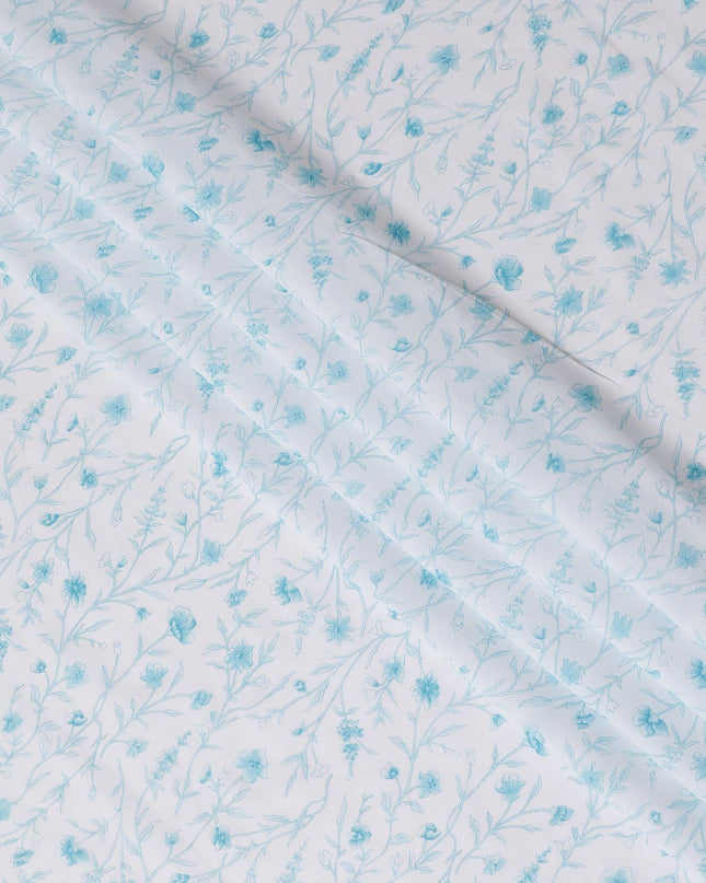 White cotton voile fabric with baby blue print in floral design-D15422