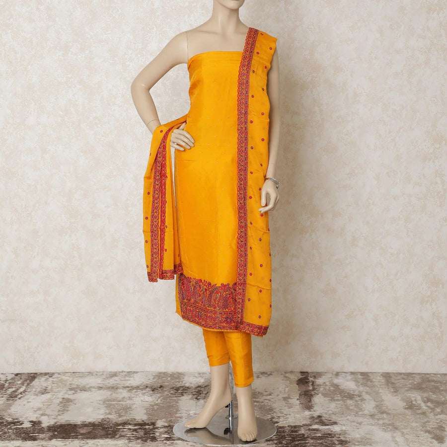 Gold yellow silk kameez with multicolor kashmiri embroidery having stone work in paisley design. Gold plain salwar with chiffon dupatta having multicolor embroidery and stone work-D12682 Regal Fabrics