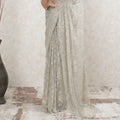 Off white, gold, silver Premium Pure metallic French chantilly lace saree having stone work in floral design-D13473
