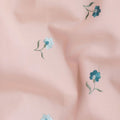 Peach cotton voile fabric with sapphire blue, olive green and powder blue embroidery in floral design-D11086