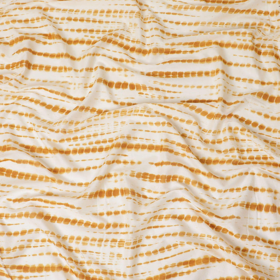 Beige cotton lawn fabric with mustard red print in fancy design-D14245