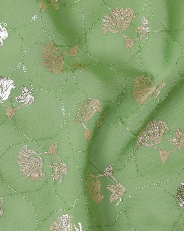 Sage green synthetic georgette fabric with same tone embroidery having gold foil print in floral design-D12030 Regal Fabrics