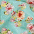 Vista blue uragiri cotton voile fabric with same tone jacquard having olive green, cerise pink, peach and off white print in floral design-D7342 Regal Fabrics