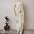 Cream Premium pure silk crepe kameez with gold embroidery, bead work, sequin work in floral design. Ceram Plain salwar with same tone chiffon dupatta having  gold embroidery and bead work-D15573