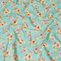 Vista blue uragiri cotton voile fabric with same tone jacquard having olive green, cerise pink, peach and off white print in floral design-D7342 Regal Fabrics