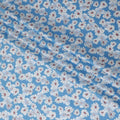 Blue cotton lawn fabric with off white, silver grey and powder blue print in floral design-D10849