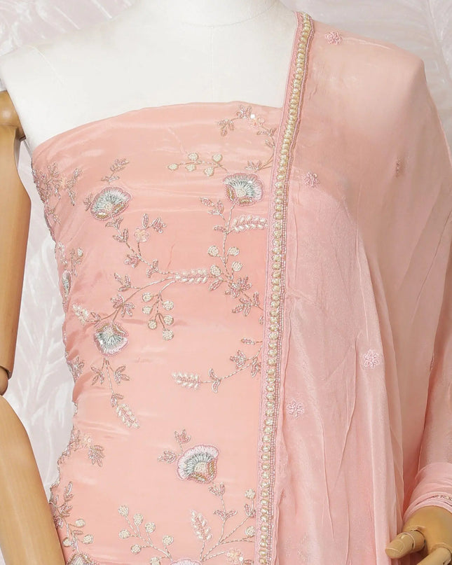 Salmon peach silk crepe kameez with same tone, vista blue embroidery, bead work and sequin work in floral design. Salmon peach plain salwar with chiffon dupatta having with same tone embroidery and bead work-D15531 Regal Fabrics