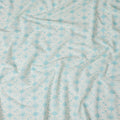 Off white cotton voile fabric with baby blue print in floral design-D15060