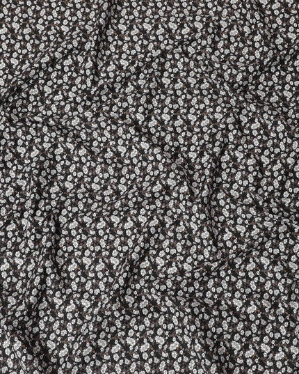 Black cotton fabric with white and meindi green print in floral design-D14842