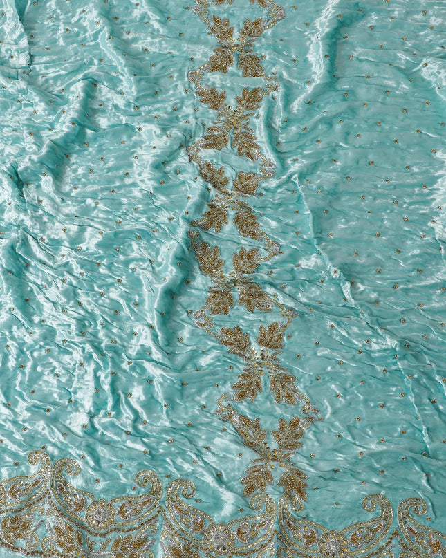 Arctic blue Rayon velvet fabric with metallic silver zardozi work, green , white and  orange stone work, green beads in fancy design