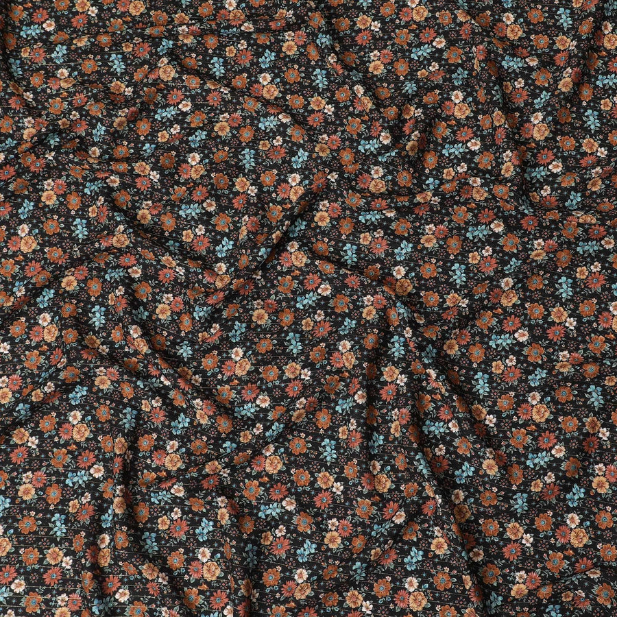 Black viscose crepe printed fabric with multi colour prints in floral design-D11159