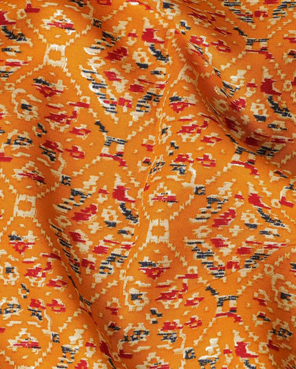 Mustard orange cotton viscose fabric with black, orange and gold print in batik design-D14195