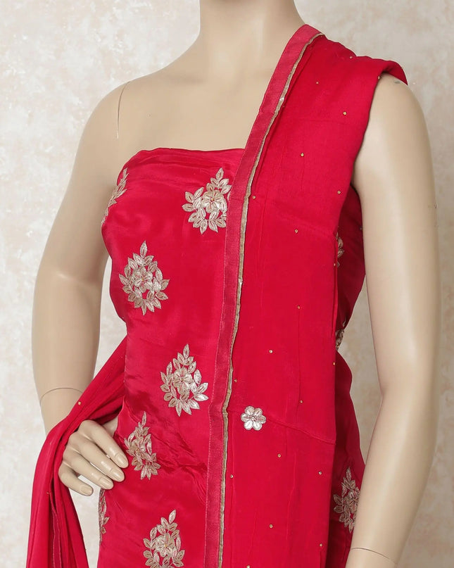 Ruby pink silk kameez with gold gota work embroidery and stone work in floral design. Ruby pink plain salwar having same tone chiffon dupatta with gold embroidery and stone work-D12688 Regal Fabrics